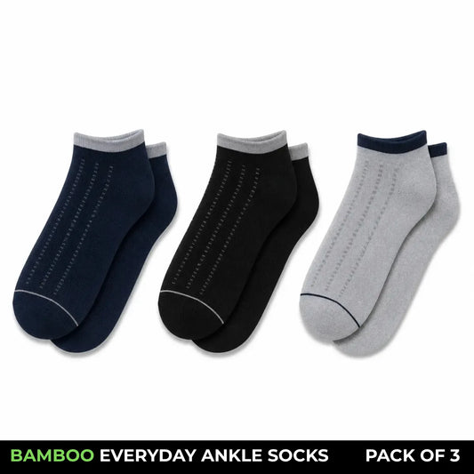 Three pairs of ankle socks displayed side by side on a white background: navy blue, black, and light gray. A black banner at the bottom reads 'BAMBOO EVERYDAY ANKLE SOCKS PACK OF 3'.