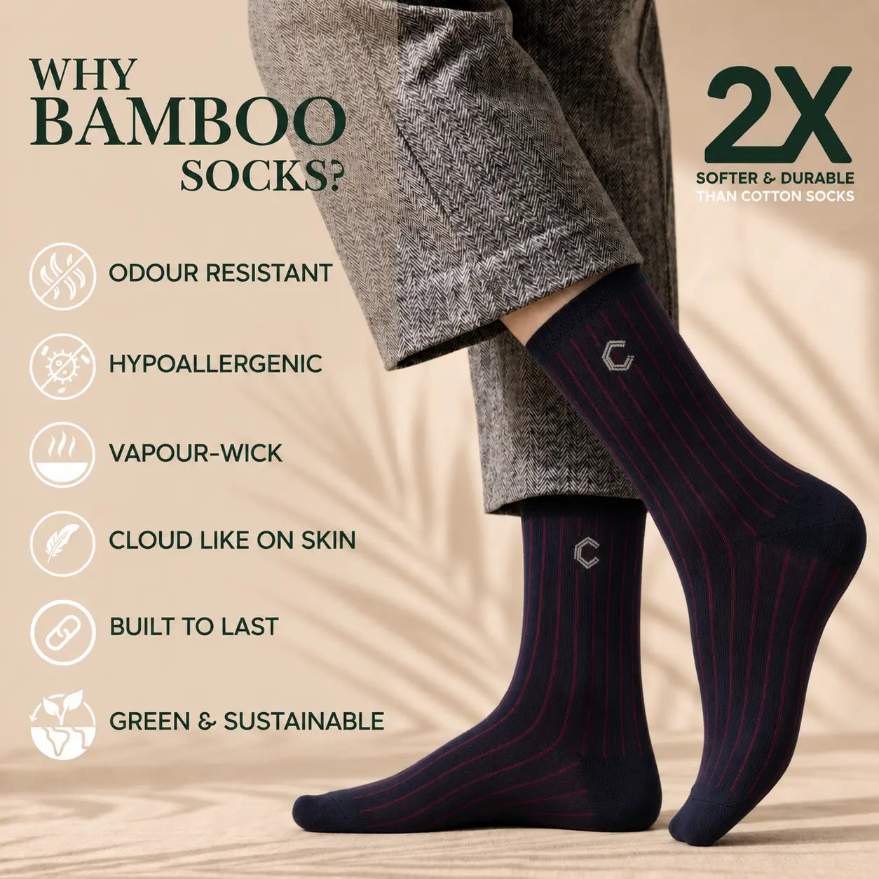 A pair of bamboo socks worn on a person's feet, shown against a beige background with promotional text highlighting features such as odor resistance, hypoallergenic properties, and a 2X count.